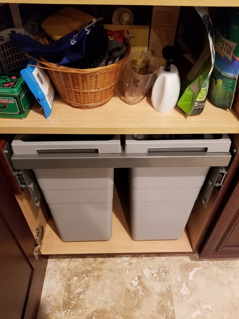 Base cabinet with double pull-out bins