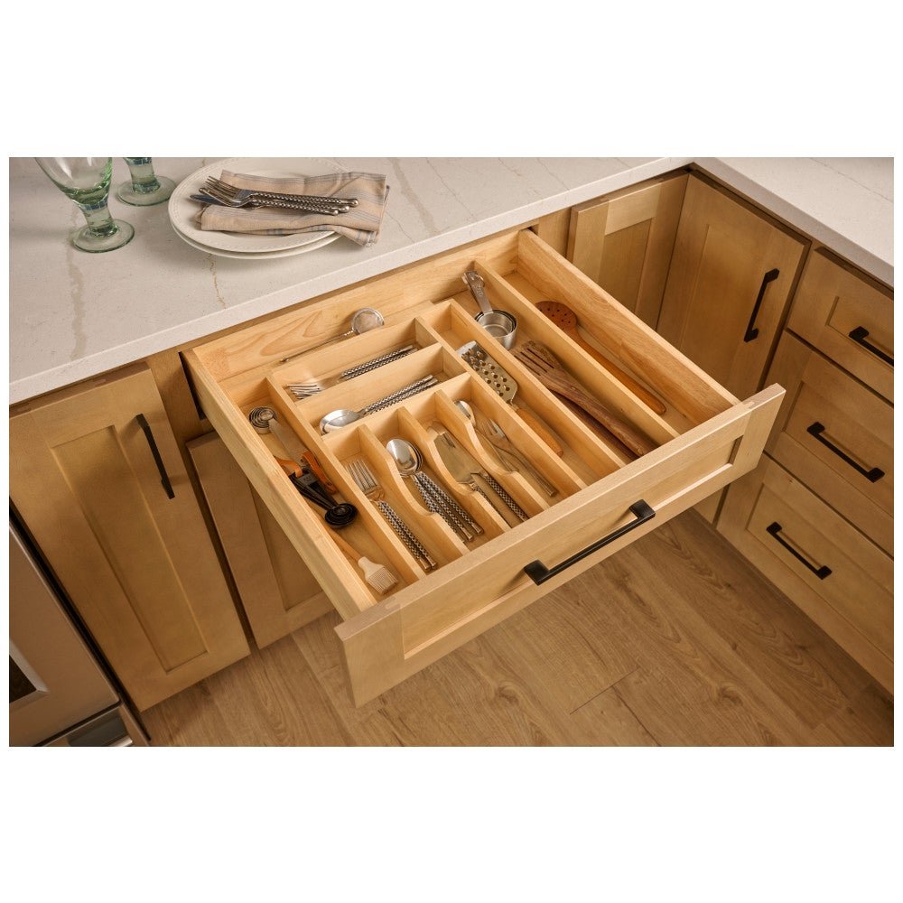 Wide cutlery drawer organizer filled with flatware