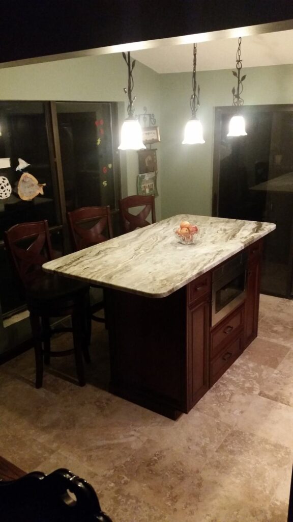 Kitchen island with microwave drawer, side view