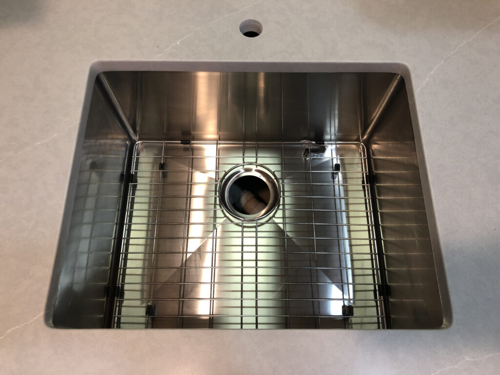 Gourmet Pro™ 22″ single bowl sink installed in a granite countertop
