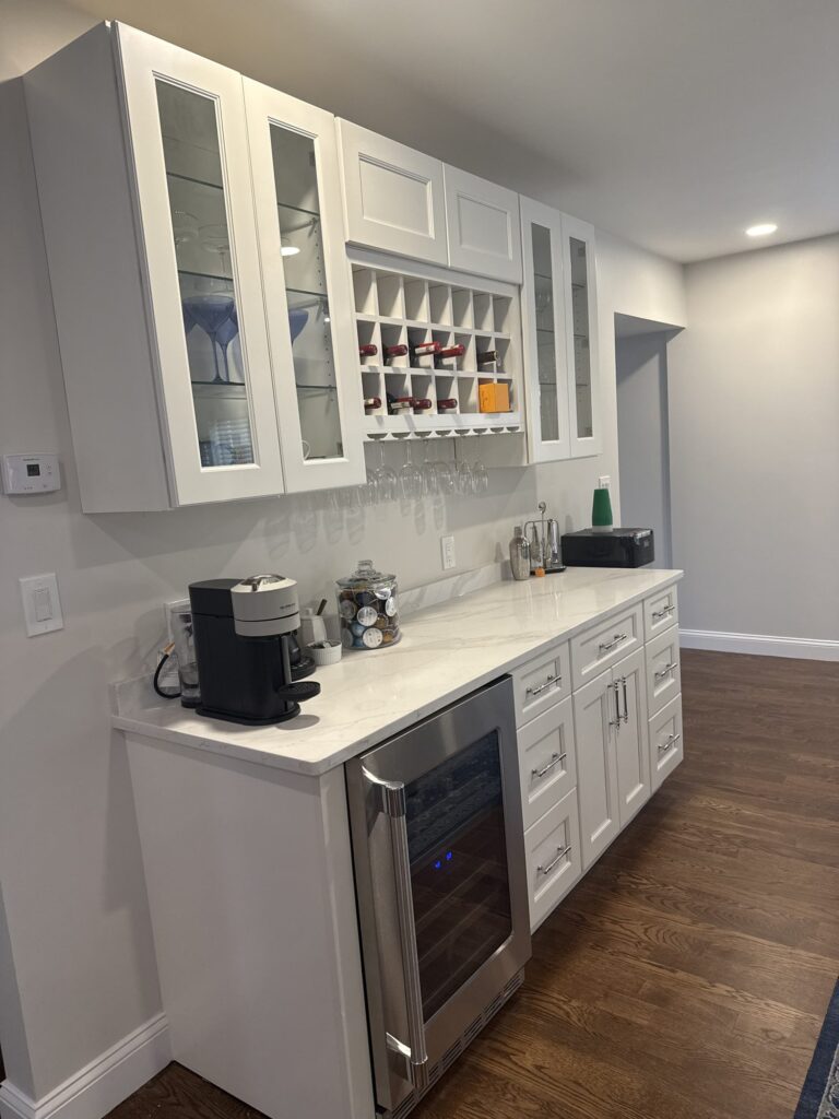 Long view of the galley run with undermount sink and quartz countertops – West Roxbury