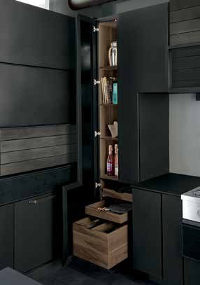 Omega custom tall cabinet with specialty interior finishes and pull-out drawers